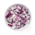 Finely chopped fresh red onion in a generic ceramic bowl isolated on white. Top view