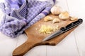 Finely chopped garlic on a wooden board