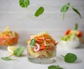 Finely chopped vegetable salad in a glass bowl