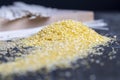 Finely crushed corn kernels into flakes for making porridge Royalty Free Stock Photo