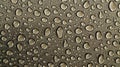 A finely textured surface resembling the pattern of rain droplets on a window with rows of tiny fibers closely packed