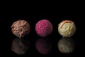 Finest chocolate truffle candies over black background. Royalty Free Stock Photo