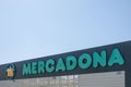 Finestrat, Spain - April 11, 2023: Mercadona supermarket logo on Mercadona store wall. Mercadona is popular supermarket