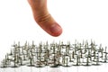 Finger above thumb tacks - drawing pins Royalty Free Stock Photo