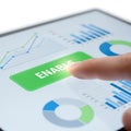 A finger activating an enable button on a digital analytics dashboard display Royalty Free Stock Photo