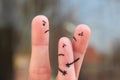 Finger art of family during quarrel. Concept of divorced parents.