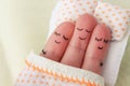 Finger art. Happy man sleeps with two women Royalty Free Stock Photo