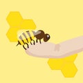 A finger with a bee. Apitherapy.