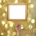 finger of a businessman pointing to a Golden picture frame on bo Royalty Free Stock Photo