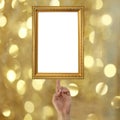 finger of a businessman pointing to a Golden picture frame on bo Royalty Free Stock Photo