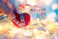 Finger catch heart shape and light decorative bokeh. Love, Valentine and holiday concept