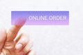 Finger clicking on virtual online order button