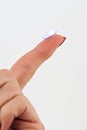 Finger with Contact Lens Royalty Free Stock Photo