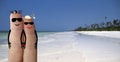 Finger face Couple in love on a honeymoon on a tropical white sand beach in Zanzibar