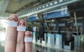 Finger face family with masks in airport, covid 19 virus outbreak