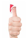 Finger face in Santa hat. Concept for Christmas day.