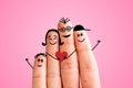 Finger family concept: Joyful finger family smiling. Pink background Royalty Free Stock Photo