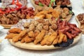 Finger food buffet with meat rolls