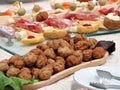 Finger food buffet with meat rolls Royalty Free Stock Photo