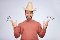 Finger gun, hat and portrait of man in studio with hand gesture for comic, humor and funny joke. Happy, Mexican party Royalty Free Stock Photo