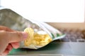 finger hand with potato chips empty Royalty Free Stock Photo