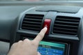 Finger on the Hazard Lights button Royalty Free Stock Photo