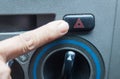 Finger hitting car emergency light button Royalty Free Stock Photo