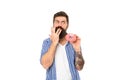 Finger licking good snack. Bearded man eat donut isolated on white. Hipster enjoy sweet snack. Enjoying snack break