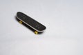 Finger mini skateboard toy on white background