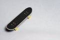 Finger mini skateboard toy on white background