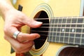 Finger picking the guitar Royalty Free Stock Photo