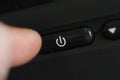 Power button being pressed on an electronic device Royalty Free Stock Photo