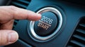 Finger pressing a car button that displays the year 2026 and the word start. Royalty Free Stock Photo