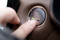 Finger Pressing Car Engine Start Stop Button Representing Modern Automotive Technology Royalty Free Stock Photo