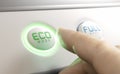 Finger pressing eco mode button. Energy saving concept Royalty Free Stock Photo