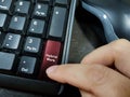 A finger pressing a keyboard key with the word `Hybrid Work` printed on i Royalty Free Stock Photo