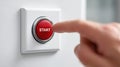 Red start button being pressed. initiation and power activation concept Royalty Free Stock Photo