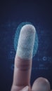 Finger pressing screen activating digital fingerprint scanner security Royalty Free Stock Photo