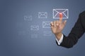 Finger pressing the touch screen mail icon. hand touching virtual icon of social network Royalty Free Stock Photo