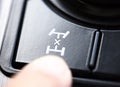 Finger pressing the 4wd button Royalty Free Stock Photo
