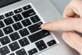 Finger pushing the button of keyboard Royalty Free Stock Photo