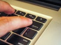 Finger pushing delete button on a keyboard of computer Royalty Free Stock Photo