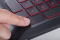 Finger pushing enter button on laptop keyboard Royalty Free Stock Photo