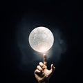 Finger reaching moon planet Royalty Free Stock Photo