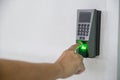 Finger scan on machine Security concept and safety. soft focus on hand scanning finger on machine concept. Businessman hand scanni