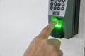 Finger scan on machine Security concept and safety. soft focus on hand scanning finger on machine concept. Businessman hand scanni