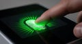 Finger Scanning for Fingerprint Authentication Technology on a Touchscreen Device Royalty Free Stock Photo