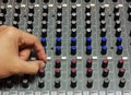 Finger someone sound tuning mixer. Royalty Free Stock Photo