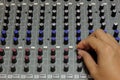 Finger someone sound tuning mixer. Royalty Free Stock Photo