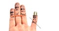 Finger in thimble armed by needle puts in fear another fingers Royalty Free Stock Photo